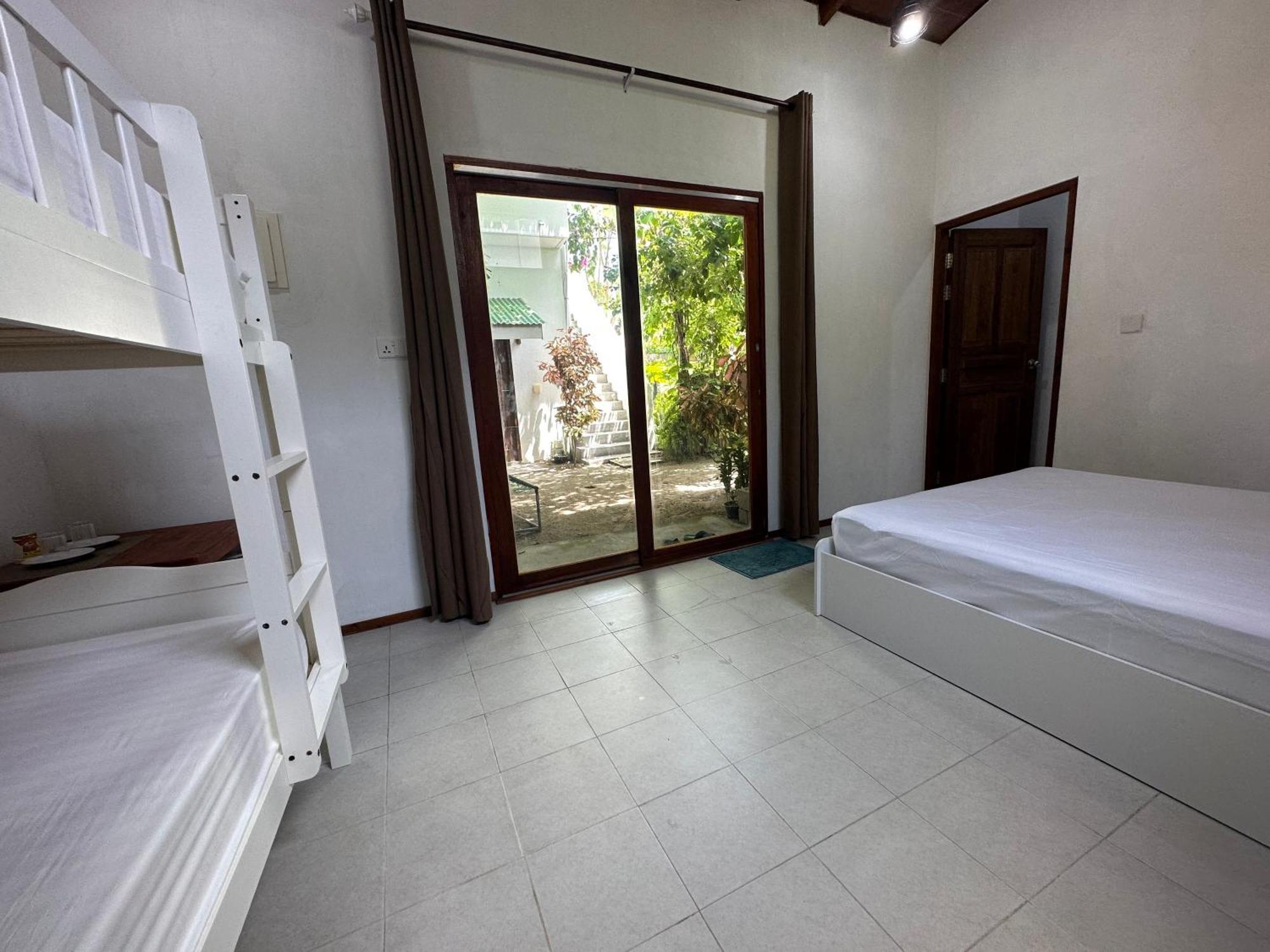 Hotel Aqua Oasis à Thoddoo Extérieur photo